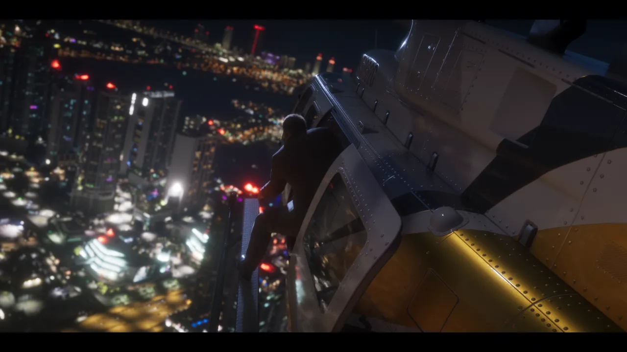 At night, a figure clinging to the outside of a yellow and white riveted helicopter, above a lit city.